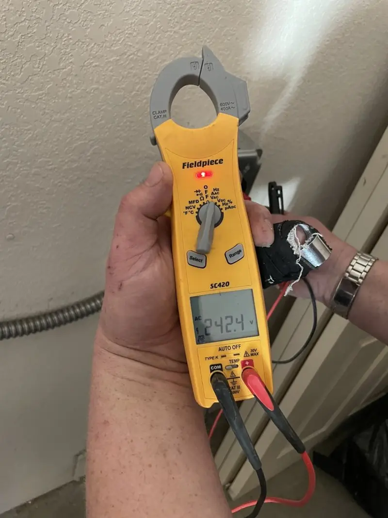 Voltage testing with clamp meter during Outlet Installation in White Bluff